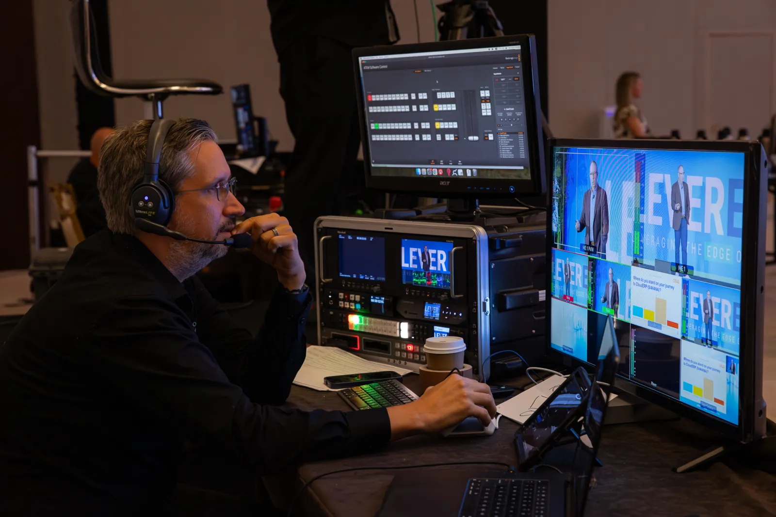 Bonomotion stream engineer running the live switcher at a conference